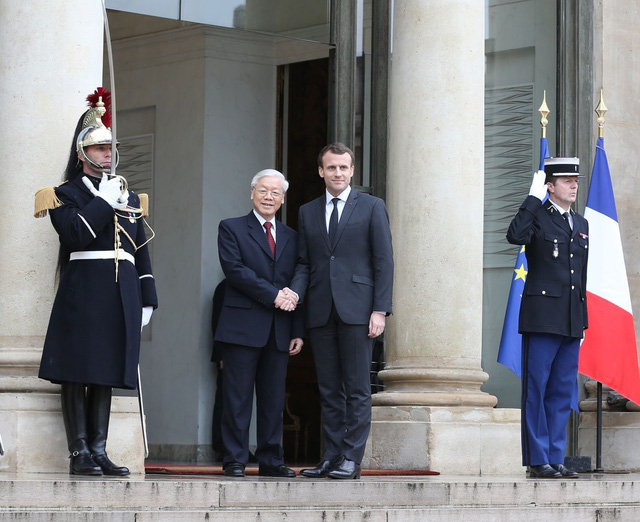 
Tổng thống Cộng hòa Pháp Emmanuel Macron đón Tổng Bí thư Nguyễn Phú Trọng
