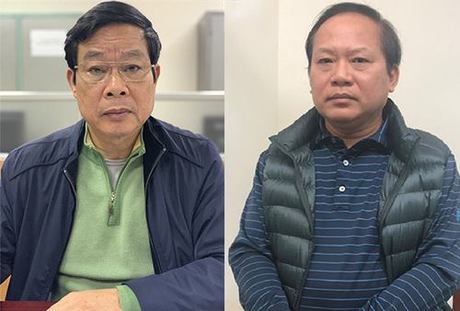 Ông Nguyễn Bắc Son (trái) và Trương Minh Tuấn khi bị bắt. Ảnh: Bộ Công an.